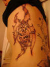 tribal with skull tattoo