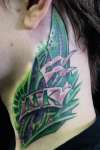 neck piece tattoo