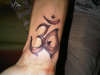 ohm design tattoo