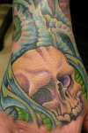 skull on hand tattoo