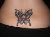 white tiger inside butterfly tattoo