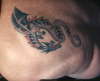 number 5 tattoo