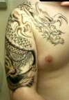 2nd dragon sittin tattoo