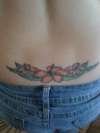 Flowers on lowerback tattoo