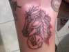 horse with warrior hand print tattoo