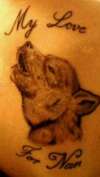 baby wolf howling tattoo