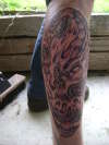 leg piece tattoo