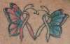 cancer ribbon butterflies tattoo