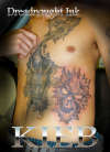 Demon chest tattoo
