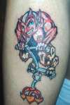 Devil on a pogo stick tattoo