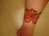 orange hibiscus tattoo