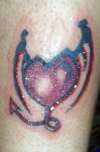 heart with wings tattoo