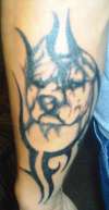 pit with tribal tattoo