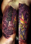 inner arm skateboard theme tattoo
