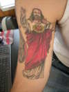Buddy Christ tattoo