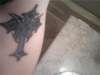 Tribal cross tattoo