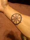 Wheel of Dharma tattoo
