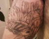 upper right arm tattoo