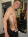 No Regrets Ribcage tattoo