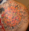dahlia on shoulder tattoo