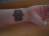 Buddhist Love Knot tattoo