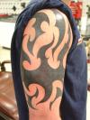 tribal flame tattoo