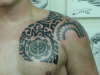 shoulder cap tattoo