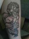 a demon crushing another my art tattoo