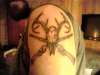 Deer and skull tattoo