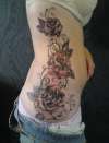 Roses on ribs tattoo