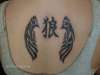 Winged Wolf tattoo