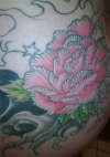 second flower half finished tattoo