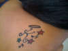 Initial & Stars tattoo