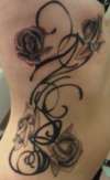 Roses on my Ribs tattoo