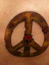 peace sign w/ladybugs tattoo