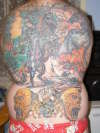 fantasy back job tattoo