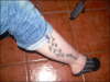 Flower's on leg tattoo
