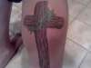 cross on my calf tattoo