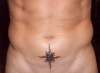 Sun on Lower Abs tattoo