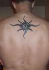 Sun on my upper back tattoo