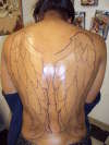 wings linework tattoo