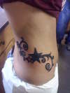 Swirly Stars on Side tattoo