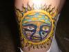 Sun Face tattoo