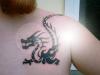 Dragon on chest tattoo