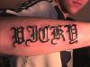 ARM LETTERS tattoo